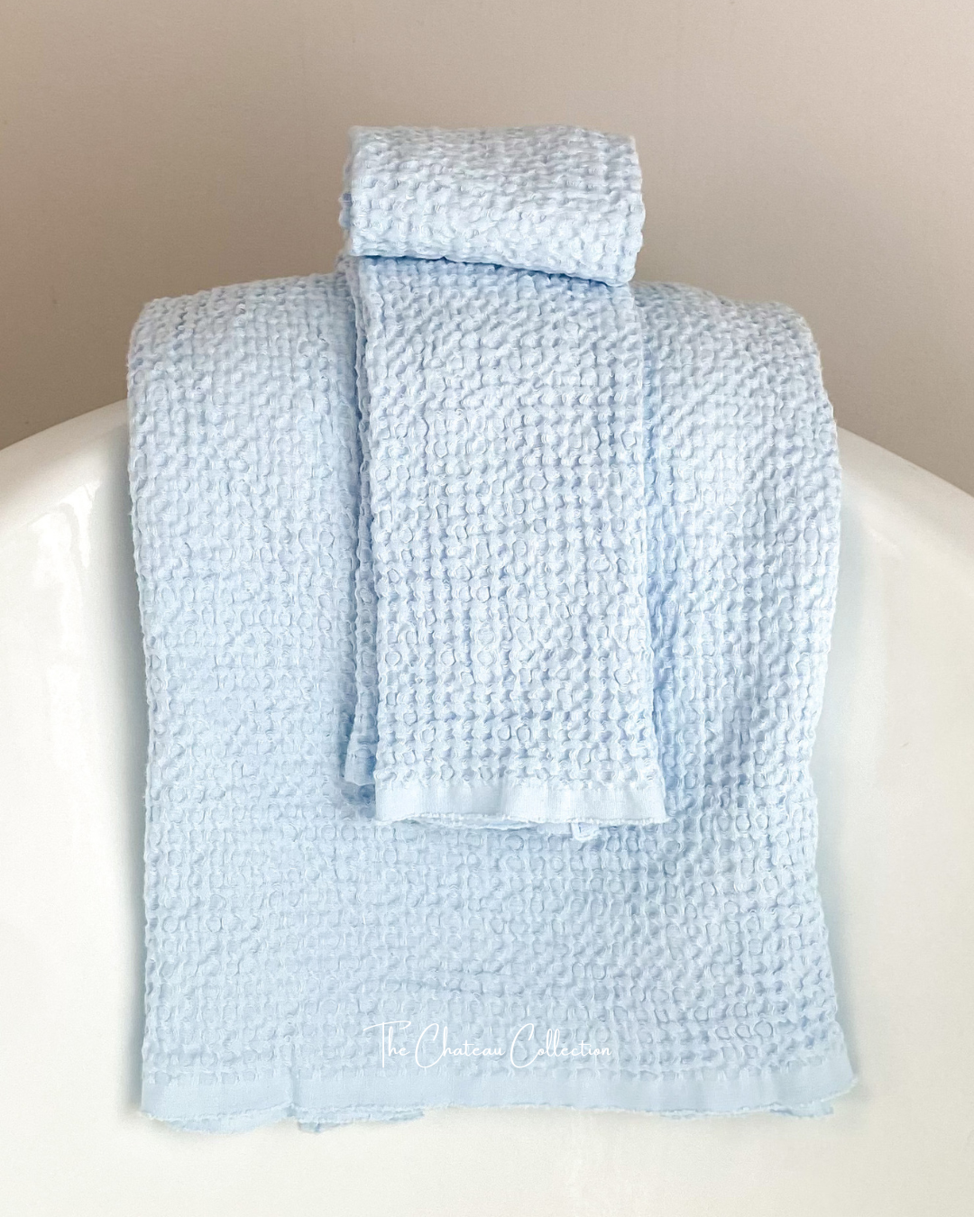 https://www.thechateaucollection.com/cdn/shop/files/SkyWaffleWeaveTowel_8f519f75-9b26-481c-9f42-50d56face29f.png?v=1695309879